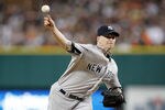 DETROIT, MI - OCTOBER 04:  A.J. Burnett #34 of the New York Yankees throws a pitch against the Detroit Tigers in the first inning of Game Four of the American League Division Series at Comerica Park on October 4, 2011 in Detroit, Michigan.  (Photo by Gregory Shamus/Getty Images)
