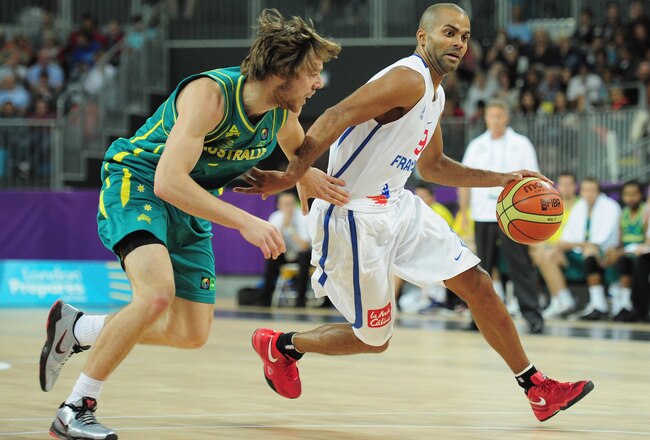LONDON, ENGLAND - AUGUST 17:  Tony Parker of France is challenged by Matthew Dellavedova of Australia during the London Prepares Series match between France and Australia at the Basketball Arena on August 17, 2011 in London, England.  (Photo by Shaun Botterill/Getty Images)