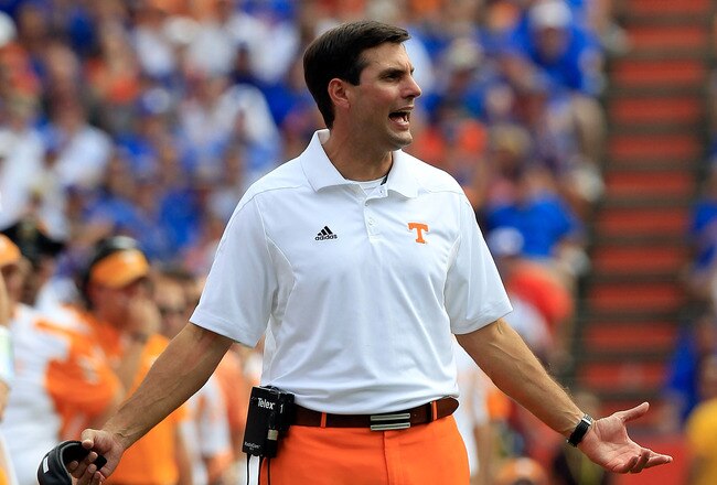GAINESVILLE, FL - SEPTEMBER 17:  Head coach of the Tennessee Volunteers Derek Dooley speaks turnover his players during a game against the Florida Gators at Ben Hill Griffin Stadium on September 17, 2011 in Gainesville, Florida.  (Photo by Sam Greenwood/Getty Images)