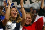 TORONTO - APRIL 8:  Ottawa Senators fan Angela Hamilton of Ottawa shows her loyalty as does friend and Leaf fan Kimberly Raycroft also of Ottawa during game one of round one of the NHL Stanley Cup Playoffs between the Ottawa Senators and the Toronto Maple Leafs at Air Canada Centre on April 8, 2004 in Toronto, Ontario. The Senators won the game 4-2, to take a 1-0 series lead.  (Photo By Dave Sandford/Getty Images)