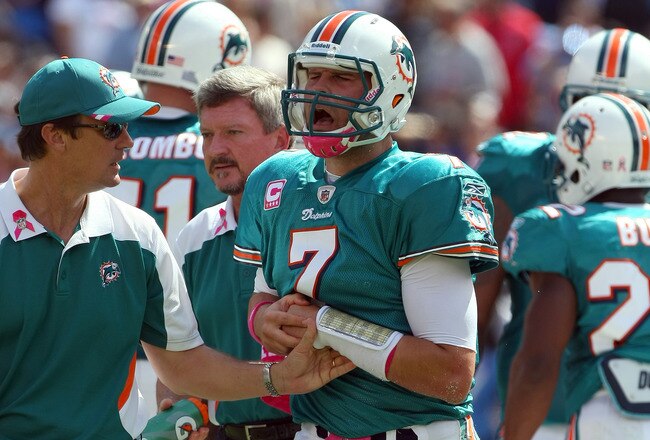 SAN DIEGO, CA - OCTOBER 2:   Quarterback Chad Henne #7 of Miami Dolphins walks off the field in pain with an injury against the San Diego Chargers during the first half of their NFL Game on October 2, 2011 at Qualcomm Stadium in San DIego, California. (Photo by Donald Miralle/Getty Images)