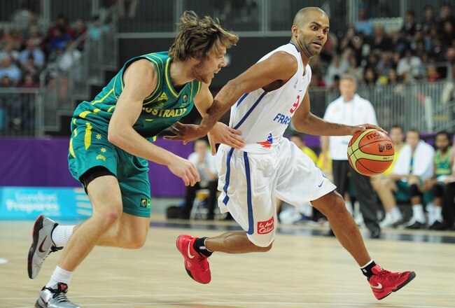LONDON, ENGLAND - AUGUST 17:  Tony Parker of France is challenged by Matthew Dellavedova of Australia during the London Prepares Series match between France and Australia at the Basketball Arena on August 17, 2011 in London, England.  (Photo by Shaun Botterill/Getty Images)
