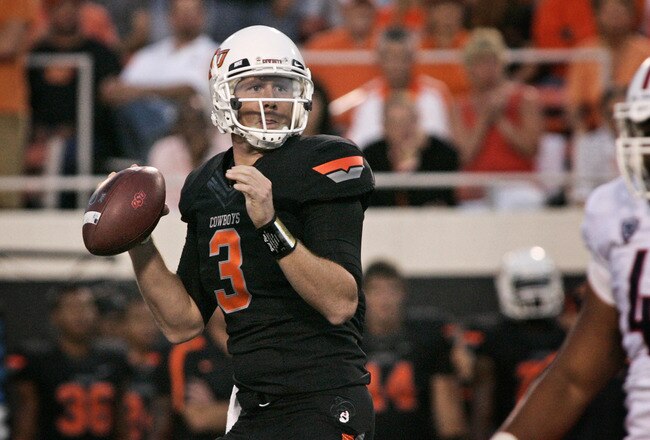 STILLWATER, OK - SEPTEMBER 8:  Quarterback Brandon Weeden #3 of the Oklahoma State Cowboys looks to throw during the second half against the Arizona Wildcats on September 8, 2011 at Boone Pickens Stadium in Stillwater, Oklahoma.  Oklahoma State defeated Arizona 37-14.  (Photo by Brett Deering/Getty Images)