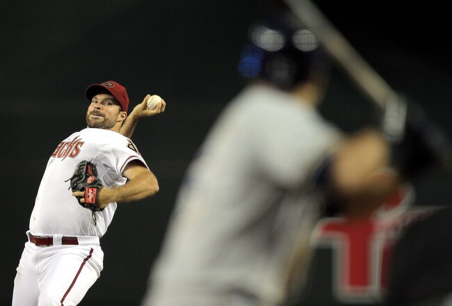 PHOENIX, AZ - OCTOBER 04:  Starting pitcher Josh Collmenter #55 of the Arizona Diamondbacks pitches in the second inning against the Milwaukee Brewers in Game Three of the National League Division Series at Chase Field on October 4, 2011 in Phoenix, Arizona.  (Photo by Doug Pensinger/Getty Images)