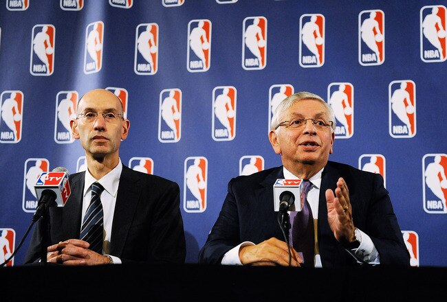 NEW YORK, NY - OCTOBER 04:  Deputy Commissioner Adam Silver (L) looks on as NBA Commissioner David Stern speaks at a press conference after NBA labor negotiations at The Westin Times Square on October 4, 2011 in New York City. Stern announced the NBA has canceled the remainder of the preseason and will cancel the first two weeks of the regular season if there is no labor agreement by Monday.  (Photo by Patrick McDermott/Getty Images)