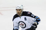 WINNIPEG, CANADA - SEPTEMBER 20: Dustin Byfuglien #33 of the Winnipeg Jets skates in the NHL game against the Columbus Blue Jackets at the MTS Centre on September 20, 2011 in Winnipeg, Manitoba, Canada. (Photo by Marianne Helm/Getty Images)