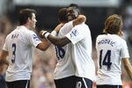 LONDON, ENGLAND - OCTOBER 02:  Kyle Walker of Tottenham Hotspur (second left) celebrates scoring his side's second goal with team mates Gareth Bale (L), Emmanuel Adebayor and Luka Modric during the Barclays Premier League match between Tottenham Hotspur and Arsenal at White Hart Lane on October 2, 2011 in London, England.  (Photo by Julian Finney/Getty Images)