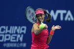 BEIJING, CHINA - OCTOBER 05:  Ana Ivanovic of Serbia returns a shot to Vera Zvonareva of Russia during the China Open at the National Tennis Center on October 5, 2011 in Beijing, China.  (Photo by Feng Li/Getty Images)