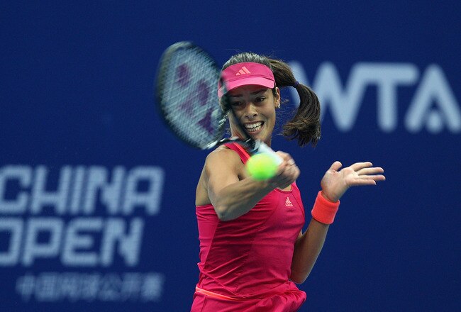 BEIJING, CHINA - OCTOBER 05:  Ana Ivanovic of Serbia returns a shot to Vera Zvonareva of Russia during the China Open at the National Tennis Center on October 5, 2011 in Beijing, China.  (Photo by Feng Li/Getty Images)