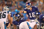 CHARLOTTE, NC - AUGUST 13:  Sage Rosenfels #18 of the New York Giants against the Carolina Panthers during their preseason game at Bank of America Stadium on August 13, 2011 in Charlotte, North Carolina.  (Photo by Streeter Lecka/Getty Images)