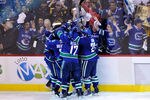 VANCOUVER, BC - JUNE 01:  Raffi Torres #13 of the Vancouver Canucks celebrates with his teammates Victor Oreskovich #38, Kevin Bieksa #3, Ryan Kesler #17 and Aaron Rome #29 after a goal late in the third period against Tim Thomas #30 of the Boston Bruins during game one of the 2011 NHL Stanley Cup Finals at Rogers Arena on June 1, 2011 in Vancouver, Canada.  (Photo by Rich Lam/Getty Images)