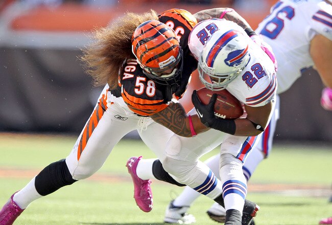 CINCINNATI, OH - OCTOBER 02:  Fred Jackson #22 of the Buffalo Bills is tackled by Rey Maualuga #58 of the Cincinnati Bengals during the game at Paul Brown Stadium on October 2, 2011 in Cincinnati, Ohio.  (Photo by Andy Lyons/Getty Images)