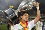 SEATTLE - OCTOBER 04:  Fredy Montero #17 of the Seattle Sounders FC holds the U.S. Open Cup trophy after defeating the Chicago Fire 2-0 in the 2011 Lamar Hunt US Open Cup Final at CenturyLink Field on October 4, 2011 in Seattle, Washington. (Photo by Otto Greule Jr/Getty Images)