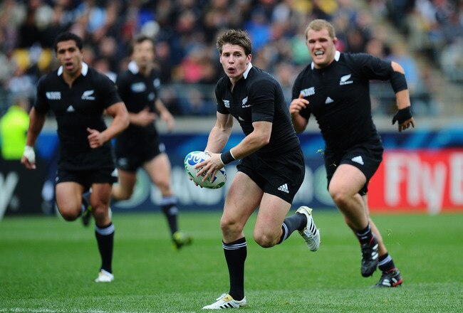 WELLINGTON, NEW ZEALAND - OCTOBER 02:  Flyhalf Colin Slade of the All Blacks runs with the ball during the IRB Rugby World Cup Pool A match between New Zealand and Canada at Wellington Regional Stadium on October 2, 2011 in Wellington, New Zealand.  (Photo by Stu Forster/Getty Images)