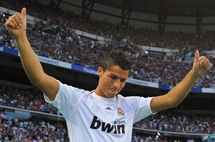 MADRID, SPAIN - JULY 06:  New Real Madrid player Cristiano Ronaldo is presented to a full house at the Santiago Bernabeu stadium on July 6, 2009 in Madrid, Spain.  (Photo by Denis Doyle/Getty Images)