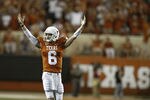 AUSTIN, TX - SEPTEMBER 10:  Backup quarterback Case McCoy #6 of the Texas Longhorns signals victory over BYU Cougars as time runs out on September 10, 2011 at Darrell K. Royal-Texas Memorial Stadium in Austin, Texas. Texas defeated BYU 17-16.  (Photo by Erich Schlegel/Getty Images)