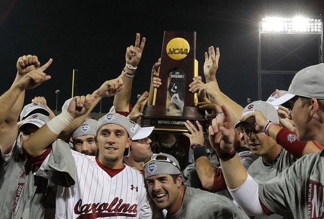OMAHA, NE - JUNE 28:  The South Carolina Gamecocks celebrate with the trophy after winning the men's 2011 NCAA College Baseball World Series at TD Ameritrade Park Omaha on June 28, 2011 in Omaha, Nebraska.  The Gamecocks defeated the Florida Gators 5-2 and won the series 2-0.  (Photo by Ronald Martinez/Getty Images)