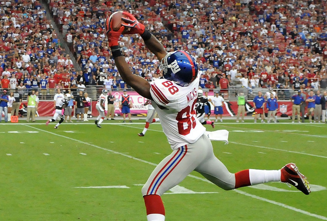 GLENDALE, AZ - OCTOBER 02:  Hakeem Nicks #88 of the New York Giants catches the game winning touchdown against the Arizona Cardinals at University of Phoenix Stadium on October 2, 2011 in Glendale, Arizona. Giants won 31-27. (Photo by Norm Hall/Getty Images)