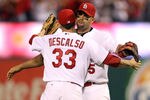 ST LOUIS, MO - OCTOBER 05:  (R-L) Albert Pujols #5 hugs Daniel Descalso #33 of the St. Louis Cardinals after the Cardinals 5-3 victory against the Philadelphia Phillies in Game Four of the National League Division Series at Busch Stadium on October 5, 2011 in St Louis, Missouri.  (Photo by Jamie Squire/Getty Images)