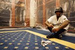 MILWAUKEE, WI - OCTOBER 07:  Nyjer Morgan #2 of the Milwaukee Brewers has a moment to himself in the clubhouse following their win against the Arizona Diamondbacks in Game Five of the National League Division Series at Miller Park on October 7, 2011 in Milwaukee, Wisconsin.  (Photo by Jared Wickerham/Getty Images)