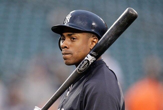 DETROIT, MI - OCTOBER 03:  Curtis Granderson #14 of the New York Yankees warms up prior to Game Three of the American League Division Series against the Detroit Tigers at Comerica Park on October 3, 2011 in Detroit, Michigan.  (Photo by Gregory Shamus/Getty Images)