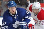 TORONTO, CANADA - OCTOBER 6:  Phil Kessel #81 of the Toronto Maple Leafs skates with the puck in a game against the Montreal Canadiens on October 6, 2011 at the Air Canada Centre in Toronto, Canada. (Photo by Claus Andersen/Getty Images)