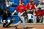 DUNEDIN, FL - MARCH 03:  Infielder Joey Votto #19 of Team Canada fouls off a pitch against the Toronto Blue Jays during a exhibition spring training game at Dunedin Stadium on March 3, 2009 in Dunedin, Florida.  (Photo by J. Meric/Getty Images)