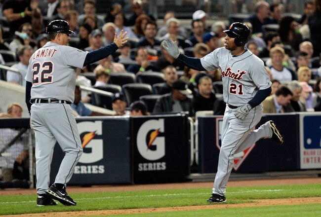 NEW YORK, NY - SEPTEMBER 30:  Delmon Young #21  of the Detroit Tigers celebrates with third base coach Gene Lamont #22 after hitting a solo home run in the first inning against the New York Yankees during Game One of the American League Division Series at Yankee Stadium on September 30, 2011 in the Bronx borough of New York City.  (Photo by Chris Trotman/Getty Images)