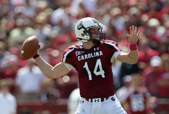 COLUMBIA, SC - OCTOBER 08:  Connor Shaw #14 of the South Carolina Gamecocks drops back to pass during their game against the Kentucky Wildcats at Williams-Brice Stadium on October 8, 2011 in Columbia, South Carolina.  (Photo by Streeter Lecka/Getty Images)