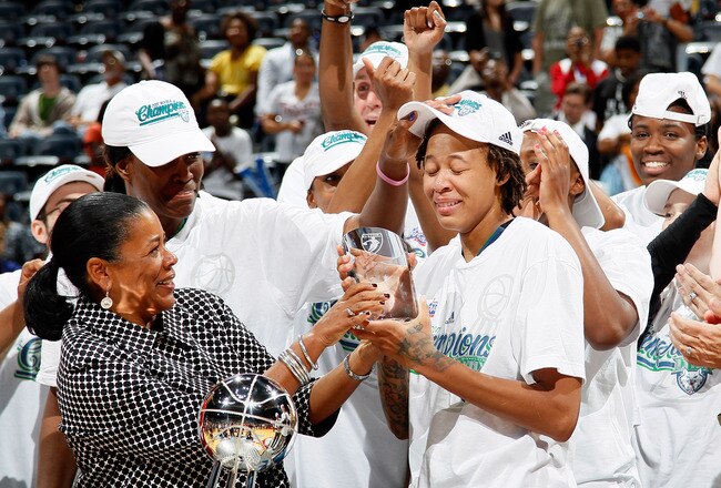 ATLANTA, GA - OCTOBER 07:  WNBA President Laurel Richie presents the MVP Trophy to Seimone Augustus #33 of the Minnesota Lynx against the Atlanta Dream in Game Three of the 2011 WNBA Finals at Philips Arena on October 7, 2011 in Atlanta, Georgia.  NOTE TO USER: User expressly acknowledges and agrees that, by downloading and or using this Photograph, user is consenting to the terms and conditions of the Getty Images License Agreement.  (Photo by Kevin C. Cox/Getty Images)