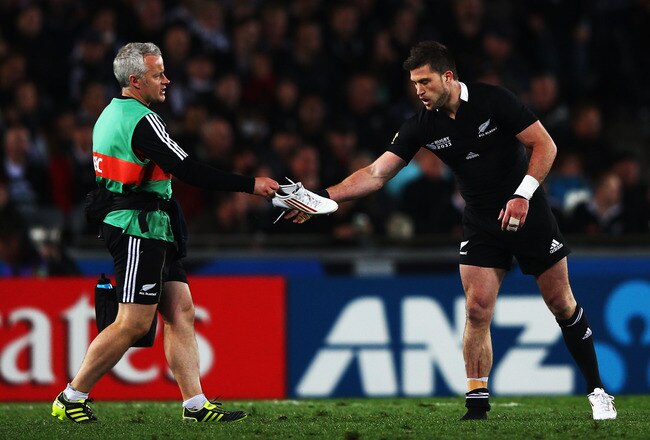 AUCKLAND, NEW ZEALAND - OCTOBER 09:   Cory Jane of the All Blacks changes his boot during quarter final four of the 2011 IRB Rugby World Cup between New Zealand and Argentina at Eden Park on October 9, 2011 in Auckland, New Zealand.  (Photo by Hannah Johnston/Getty Images)
