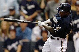 MILWAUKEE, WI - OCTOBER 02:  Nyjer Morgan #2 of the Milwaukee Brewers hits a two-run single in the sixth inning against the Arizona Diamondbacks during Game Two of the National League Division Series at Miller Park on October 2, 2011 in Milwaukee, Wisconsin.  (Photo by Jared Wickerham/Getty Images)
