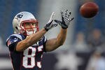 FOXBORO, MA - SEPTEMBER 1:   Wes Welker #83 of the New England Patriots completes a drill before a game with the New York Giants at Gillette Stadium on September 1, 2011 in Foxboro, Massachusetts. (Photo by Jim Rogash/Getty Images)