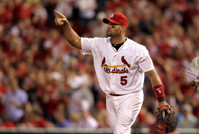 ST LOUIS, MO - OCTOBER 05:  Albert Pujols #5 of the St. Louis Cardinals reacts in the eighth inning after Hunter Pence #3 of the Philadelphia Phillies grounds out in Game Four of the National League Division Series at Busch Stadium on October 5, 2011 in St Louis, Missouri.  (Photo by Jamie Squire/Getty Images)