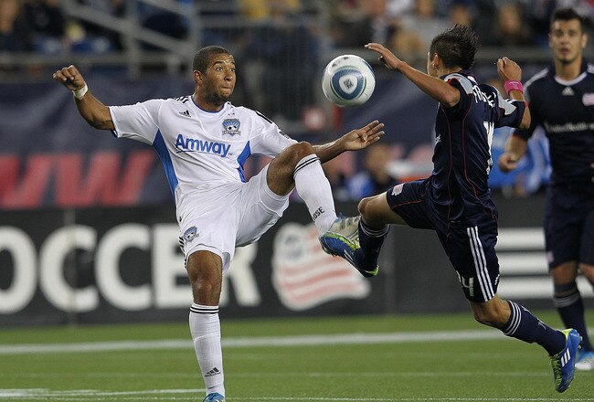 FOXBORO, MA - OCTOBER 8:  Diego Fagundez #14 of the New England Revolution shoots on net but is stopped by Justin Morrow #15 of the San Jose Earthquakes in the second half at Gillette Stadium on October 8, 2011 in Foxboro, Massachusetts. (Photo by Jim Rogash/Getty Images)