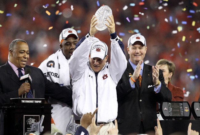 GLENDALE, AZ - JANUARY 10:  Head coach Gene Chizik of the Auburn Tigers celebrates the Tigers 22-19 victory against the Oregon Ducks during the Tostitos BCS National Championship Game at University of Phoenix Stadium on January 10, 2011 in Glendale, Arizona.  (Photo by Christian Petersen/Getty Images)