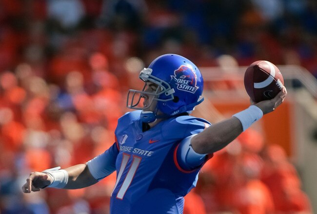 BOISE, ID - OCTOBER 01:  Kellen Moore #11 of the Boise State Broncos passes against the Nevada Wolf Pack at Bronco Stadium on October 1, 2011 in Boise, Idaho.  (Photo by Otto Kitsinger III/Getty Images)