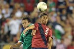 PHILADELPHIA, PA - AUGUST 10: Michael Orozco Fiscal #5 of the United States and Omar Arellano #9 of Mexico go up to head the ball at Lincoln Financial Field on August 10, 2011 in Philadelphia, Pennsylvania. The game ended 1-1. (Photo by Drew Hallowell/Getty Images)