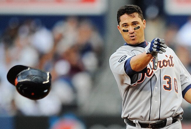 NEW YORK, NY - OCTOBER 02:  Magglio Ordonez #30 of the Detroit Tigers throws his helmet after the top of the third inning against the New York Yankees during Game Two of the American League Division Series at Yankee Stadium on October 2, 2011 in the Bronx borough of New York City.  (Photo by Patrick McDermott/Getty Images)