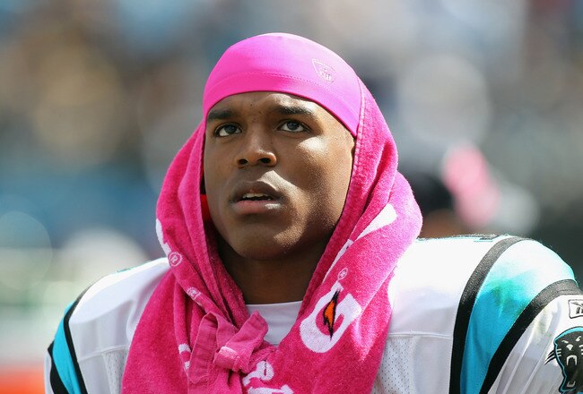 CHARLOTTE, NC - OCTOBER 09:   Cam Newton #1 of the Carolina Panthers watches on from the sidelines during their game against the New Orleans Saints at Bank of America Stadium on October 9, 2011 in Charlotte, North Carolina.  (Photo by Streeter Lecka/Getty Images)