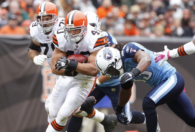 CLEVELAND, OH - OCTOBER 02:  Running back Peyton Hillis #40 of the Cleveland Browns is tackled by safety Michael Griffin #33 of the Tennessee Titans at Cleveland Browns Stadium on October 2, 2011 in Cleveland, Ohio.  (Photo by Matt Sullivan/Getty Images)