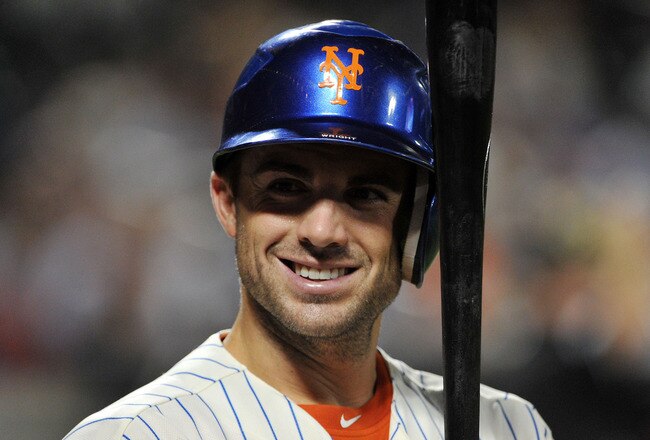 NEW YORK, NY - SEPTEMBER 12: David Wright #5 of the New York Mets  smiles as he stands in the on deck circle during the game against the Washington Nationals at Citi Field on September 12, 2011 in the Flushing neighborhood of the Queens borough of New York City. (Photo by Christopher Pasatieri/Getty Images)