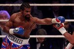 HAMBURG, GERMANY - JULY 02:  David Haye of England jabs Wladimir Klitschko of the Ukraine during their heavy weight unification match at the Imtech Arena on July 2, 2011 in Hamburg, Germany.  (Photo by Scott Heavey/Getty Images)