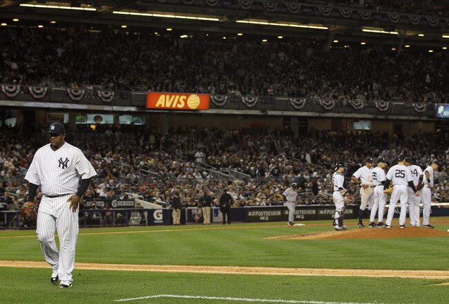 NEW YORK, NY - OCTOBER 06:  CC Sabathia #52 of the New York Yankees walks back to the dugout after he was taken out of the game in the top of the sixth inning against the Detroit Tigers during Game Five of the American League Championship Series at Yankee Stadium on October 6, 2011 in the Bronx borough of New York City.  (Photo by Nick Laham/Getty Images)