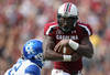 COLUMBIA, SC - OCTOBER 08:  Marcus Lattimore #21 of the South Carolina Gamecocks runs with the ball against the Kentucky Wildcats during their game at Williams-Brice Stadium on October 8, 2011 in Columbia, South Carolina.  (Photo by Streeter Lecka/Getty Images)