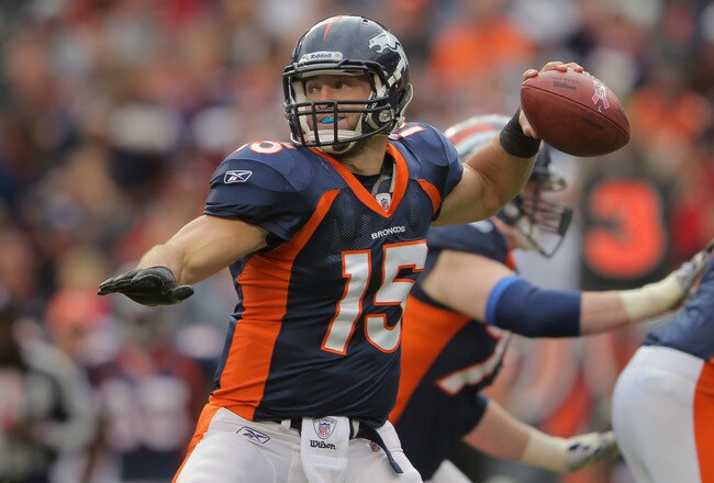 DENVER, CO - OCTOBER 09:  Quarterback Tim Tebow #15 of the Denver Broncos delivers a pass against the San Diego Chargers at Sports Authority Field at Mile High on October 9, 2011 in Denver, Colorado. The Chargers defeated the Broncos 29-24.  (Photo by Doug Pensinger/Getty Images)