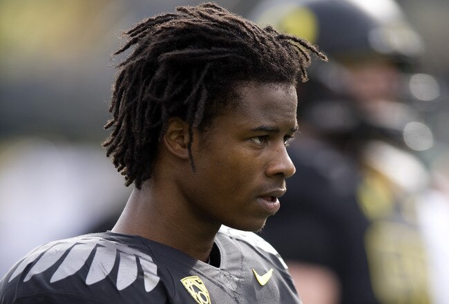 EUGENE, OR - NOVEMBER 6: Cornerback Cliff Harris #13 of the Oregon Ducks warms up before the game against the Washington Huskies at Autzen Stadium on November 6, 2010 in Eugene, Oregon. (Photo by Steve Dykes/Getty Images)