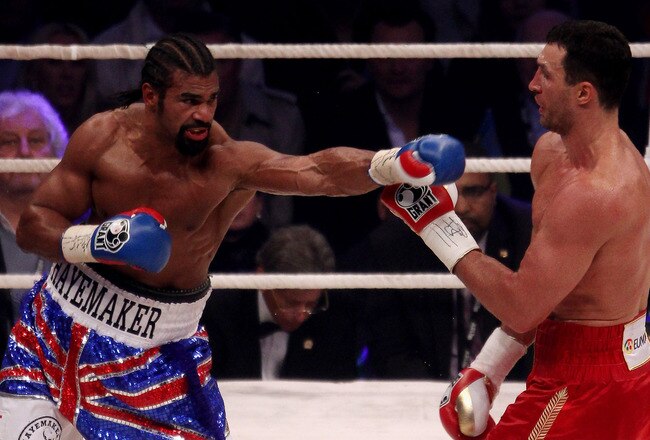 HAMBURG, GERMANY - JULY 02:  David Haye of England jabs Wladimir Klitschko of the Ukraine during their heavy weight unification match at the Imtech Arena on July 2, 2011 in Hamburg, Germany.  (Photo by Scott Heavey/Getty Images)