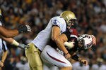 COLUMBIA, SC - SEPTEMBER 17:  Nose guard Jared Marks #91 of the Navy Midshipmen tackles quarterback Stephen Garcia #5 of the South Carolina Gamecocks September 17, 2011 at Williams-Brice Stadium in Columbia, South Carolina.  (Photo by Al Messerschmidt/Getty Images)