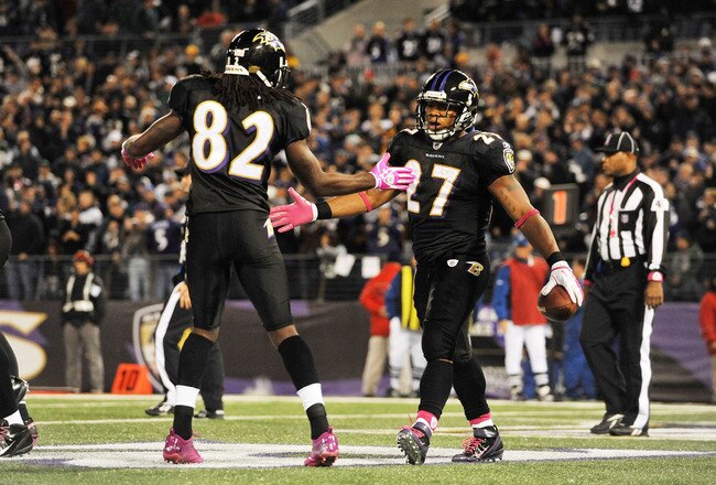 BALTIMORE - OCTOBER 2:  Ray Rice #27 of the Baltimore Ravens celebrates a touchdown against the New York Jets at M&T Bank Stadium on October 2. 2011 in Baltimore, Maryland. The Ravens defeated the Jets 34-17. (Photo by Larry French/Getty Images)
